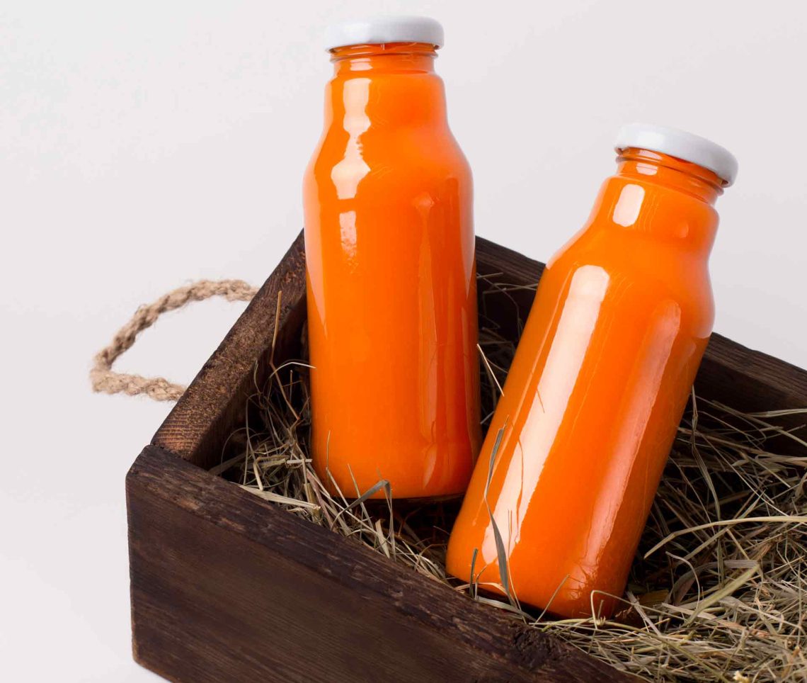glass-bottle-with-detox-juice-of-fresh-oranges-MGMTKYD.jpg